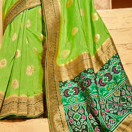 Lush Green Fashionable Woven Patola Silk Saree