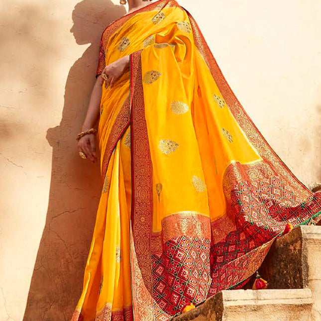 Showy Yellow Fashionable Woven Patola Silk Saree